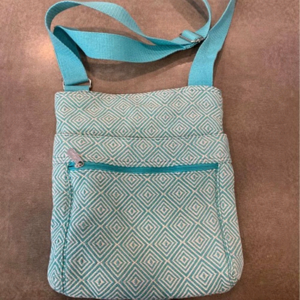 𝅺thirty ONE crossbody. Teal and white. Brand new. Adjustable strap.